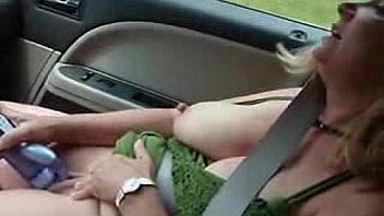 Horny mature wife masturbates in car